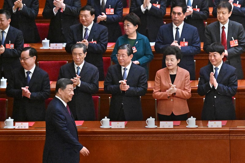 China’s President Xi Jinping arrives for the closing session of the National People’s Congress in Beijing, March 11, 2025.