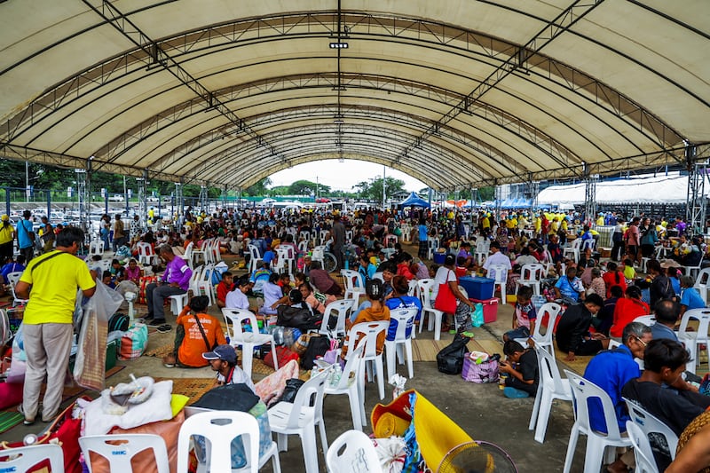 Residents shelter during clashes along the disputed border between Thailand and Cambodia in Buriram, Thailand, July 24, 2025.